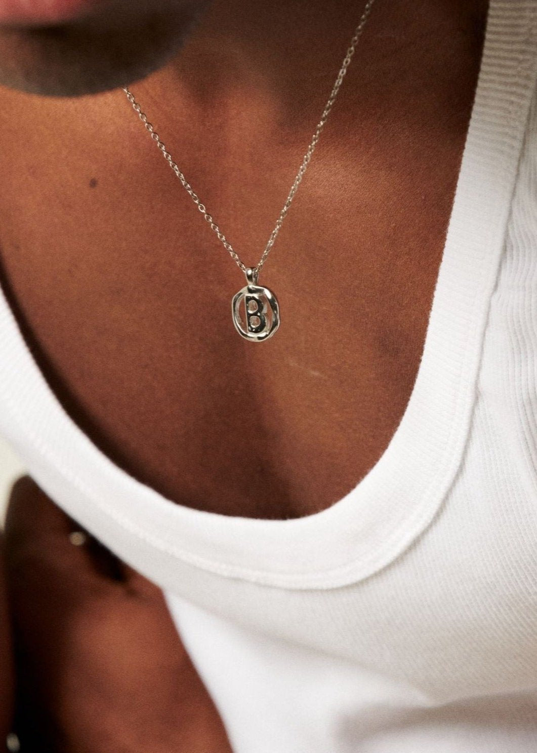 B / SILVER - THE IDENTITY