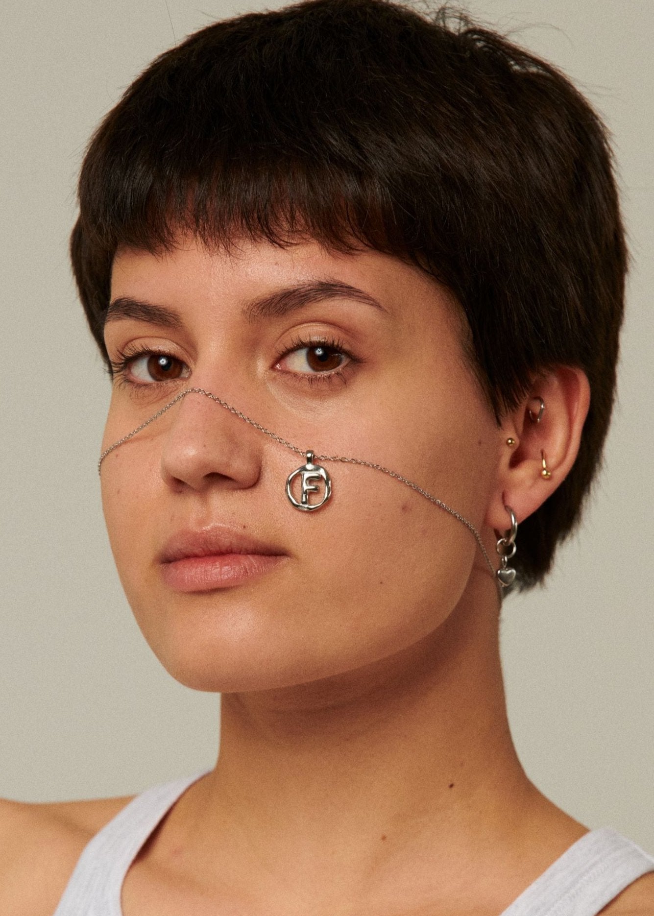 F / SILVER - THE IDENTITY