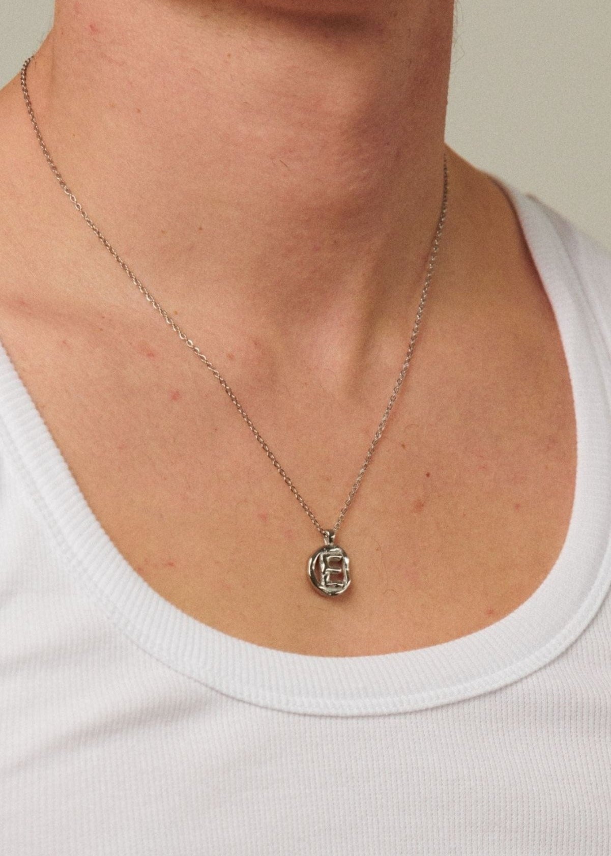 E / SILVER - THE IDENTITY