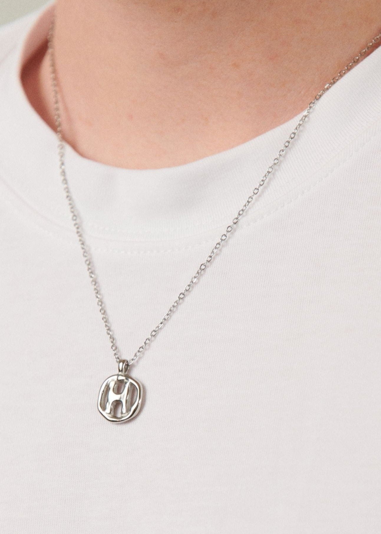 H / SILVER - THE IDENTITY